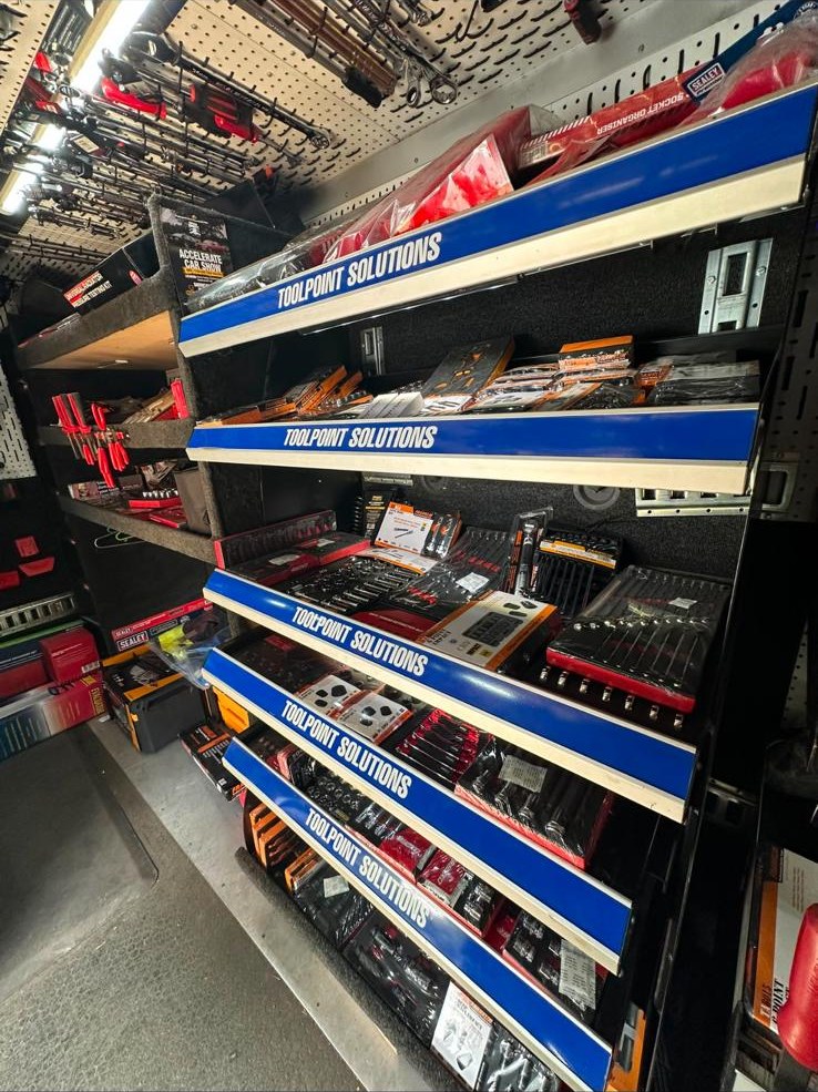 Tools on the shelves inside the ToolPoint van