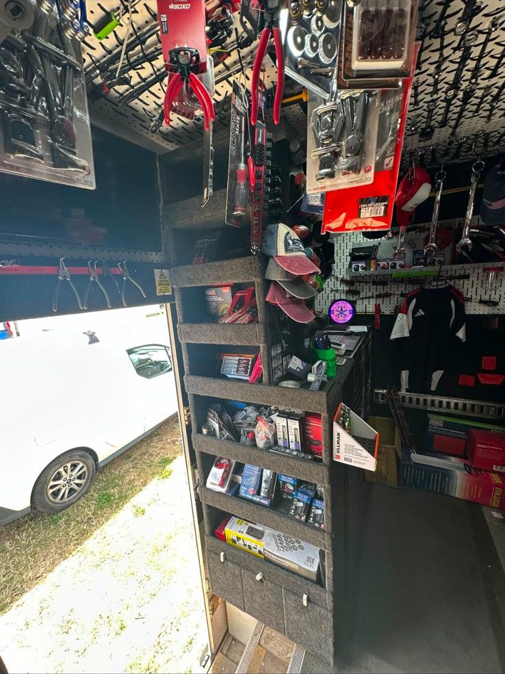 Tools on the shelves inside the ToolPoint van