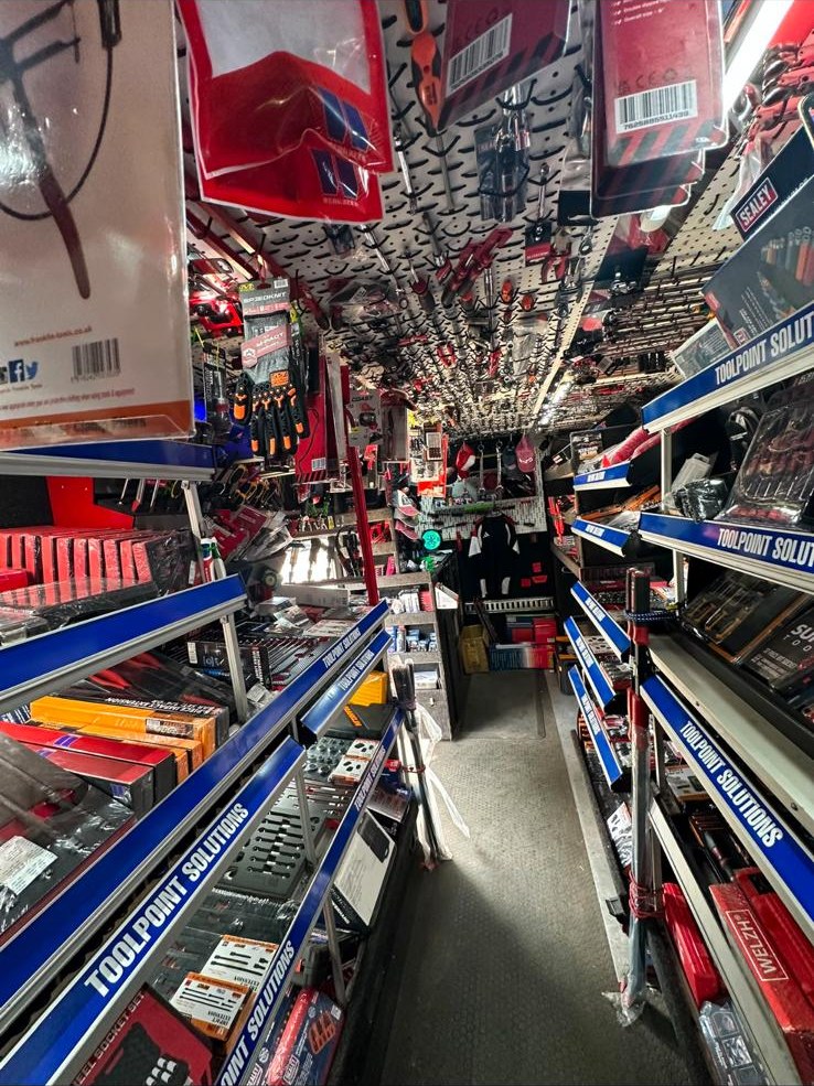 Tools on the shelves inside the ToolPoint van