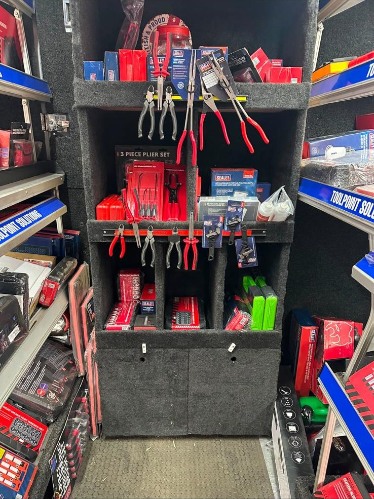 Tools on the shelves inside the ToolPoint van